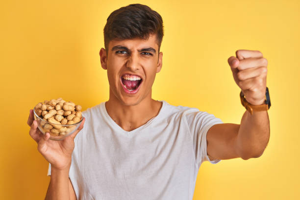 310+ Man Eating Peanuts Stock Photos, Pictures & Royalty-Free Images -  iStock | Eating nuts