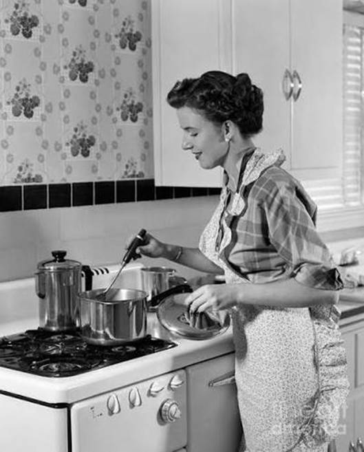Woman Cooking On Stovetop, C.1950s Poster by H. Armstrong Roberts/ClassicStock - Science Source Prints